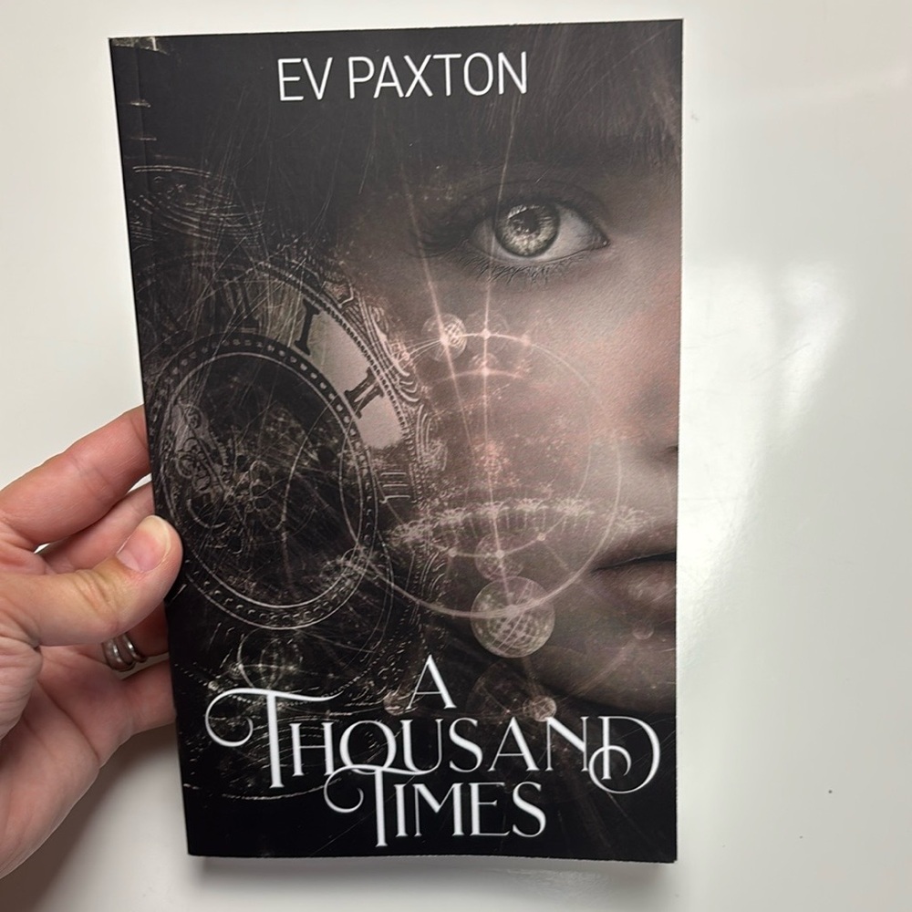 A Thousand Times (In Time) Paperback book